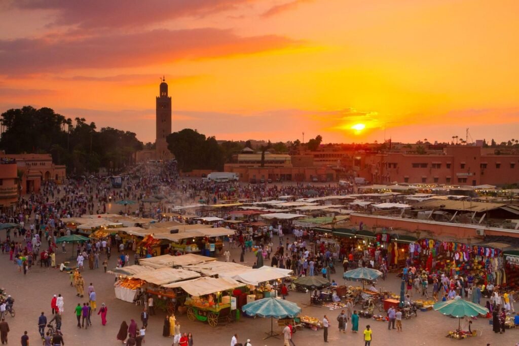 Marrakech medina rooftops and Koutoubia minaret at the end of a Casablanca tour